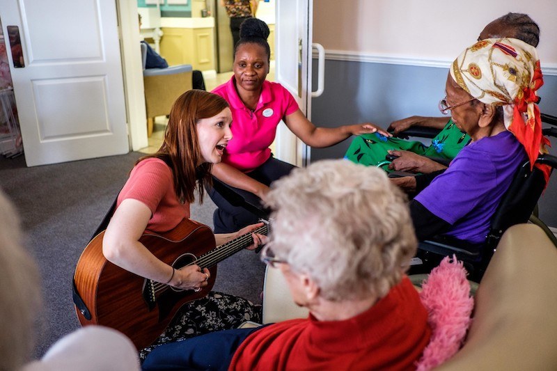 Photo Credit: Ivan Gonzalez © Live Music Now musicians Zoe Wren and Maz O’Connor working on Live Music in Care residency with team members and residents at Queen's Oak Excelcare Care Home Peckham