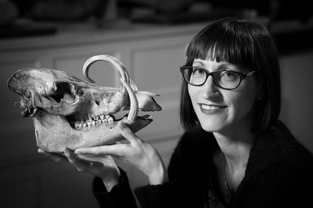 Helen smiling with babirusa skull in GMZ